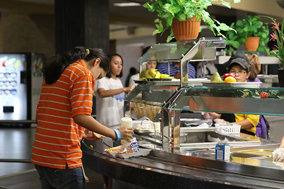 Students in the lunch lines wait for their new healthy options.