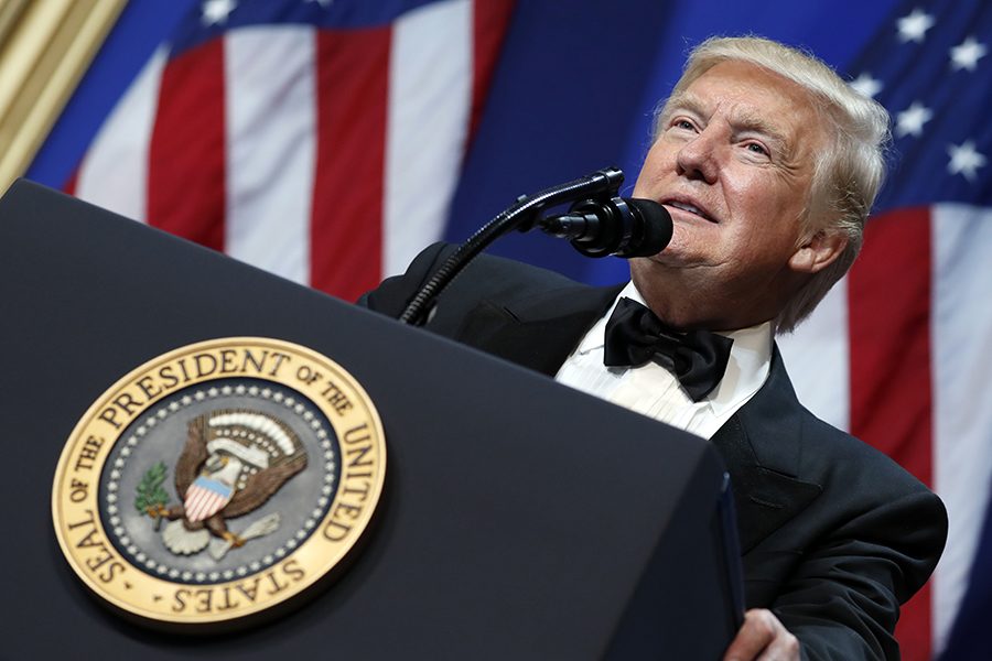President Donald Trump speaks at The Salute To Our Armed Services Inaugural Ball in Washington, Friday, Jan. 20, 2017. (AP Photo/Alex Brandon)