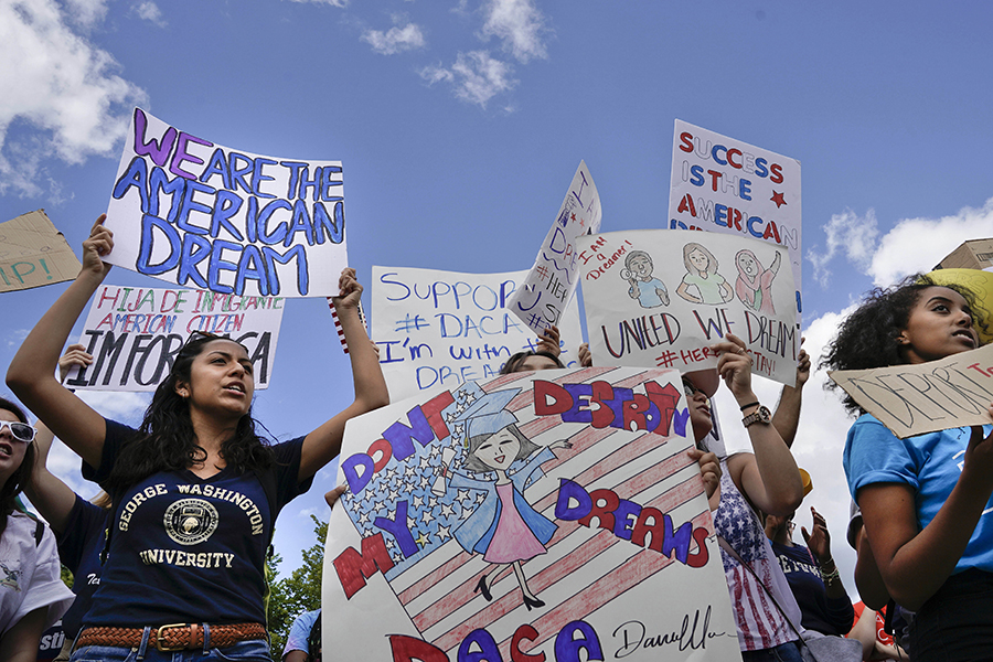Supporters of Deferred Action for Childhood Arrival program (DACA) demonstrate on Pennsylvania Avenue in front of the White House in Washington, Saturday, Sept. 9, 2017. President Donald Trump ordered and end of protections for young immigrants who were brought into the country illegally as children, but gave Congress six months to act on it. (AP Photo/Pablo Martinez Monsivais)