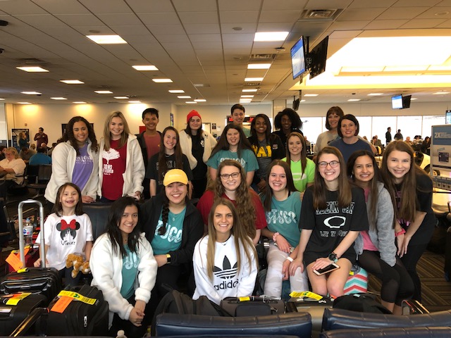 Student Council Officers, sponsor and NHS members meet at the airport before their flight early in the morning.