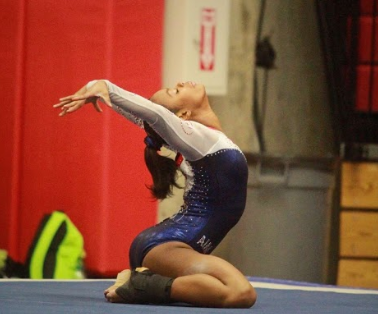 Sophomore Leah Smith strikes the ending pose to top off her difficult floor routine at the regional qualifying meet in Oklahoma, April 12. Because of her success at the meet, Smith now heads to the 2019 Women's Junior Olympic Nationals in May.