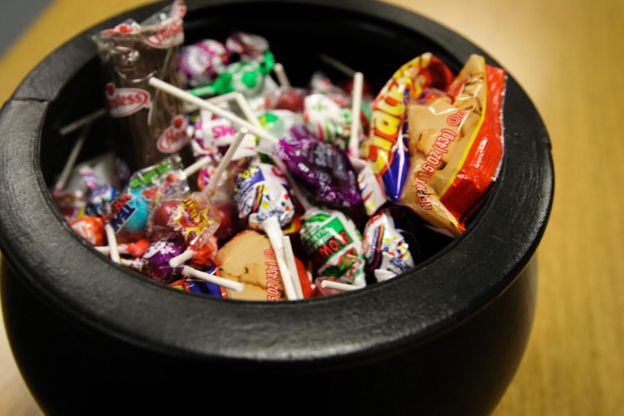 Halloween candy and decorations in stores lead buyers to shop a month before the holiday.