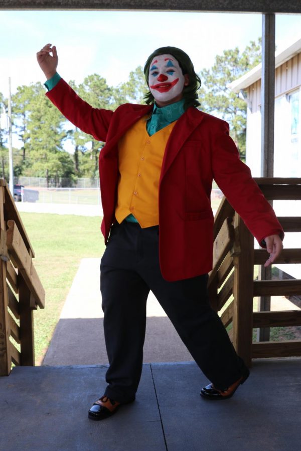 Bringing the Joker to life at Klein Oak, junior Trey Munoz emulates the classic pose.