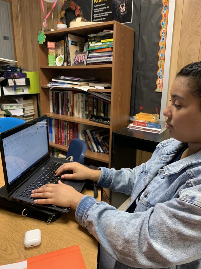 Senior Laila Henry works on a project about Sojourner Truth  during the Slave Rebellion. The new African American Studies class in one way students can explore history of a select group of people. 