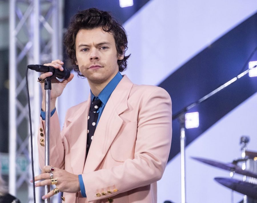 Harry+Styles+performs+on+NBC%E2%80%99s+Today+Show+wearing+a+baby+pink+suit%2C+a+color+traditionally+associated+with+femininity.+Styles+is+known+for+wearing+clothes+that+fit+what+some+people+label+as+non-masculine%3B+recently%2C+he+wore+a+dress+for+a+photoshoot+that+famously+drew+criticism+from+speakers+like+conservative+voice+Candance+Owens.+The+backlash+he%E2%80%99s+received+for+doing+nothing+more+than+dressing+how+he+wants+to+reflects+the+necessity+in+our+society+to+let+go+of+terms+like+%E2%80%9Cfeminine%E2%80%9D+and+%E2%80%9Cmasculine.%E2%80%9D+