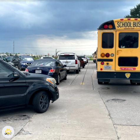 Lines of buses and cars wait to get out of the south lot right after school. “There was an incident a couple days ago where a car pulled into the exit during peak traffic time after school...another car pulled in behind… causing one of the lanes to be stopped up,” Cole said. 