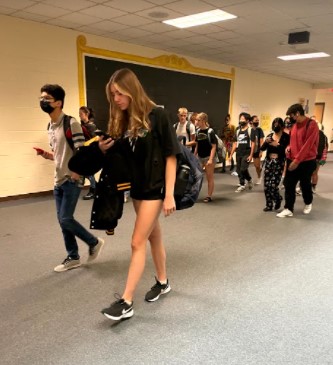 Students are able to use their cell phones during passing period and at lunches. In the classroom though, students are to put phones and earbuds away.