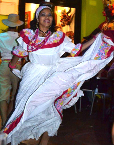 Defined by its mesmerizing beauty and rhythm, polleras is a type of dress worn in traditional dances, a clear example of Panamanian history that can be seen alongside many cultures across Latin America. Deysa Bennett performs a traditional dance with friends and familys support.