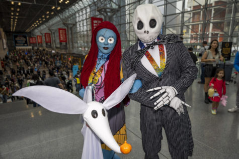 Attendees dressed as characters from the film The Nightmare Before Christmas pose during New York Comic Con at the Jacob K. Javits Convention Center in New York. 