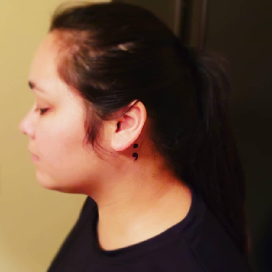 I have a purple semicolon behind my left ear as a tribute to a very close friend who lost her life to suicide; it opens the door for people who need support to ask questions as well. Purple was Kaylas favorite color, and its also the color for suicide awareness.
- Alana Clark, AP statistics teacher.