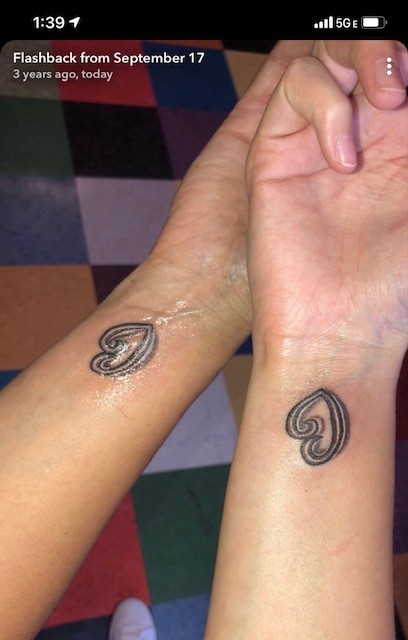 Its a mother-daughter tattoo I got with my daughter. Was her first tattoo and mine. Its a take off the James Avery design called A Mothers Love. Shes my only daughter and the only person who could talk me into a tattoo...but I adore it and that its something we share.
-Brenda Sims, staff.