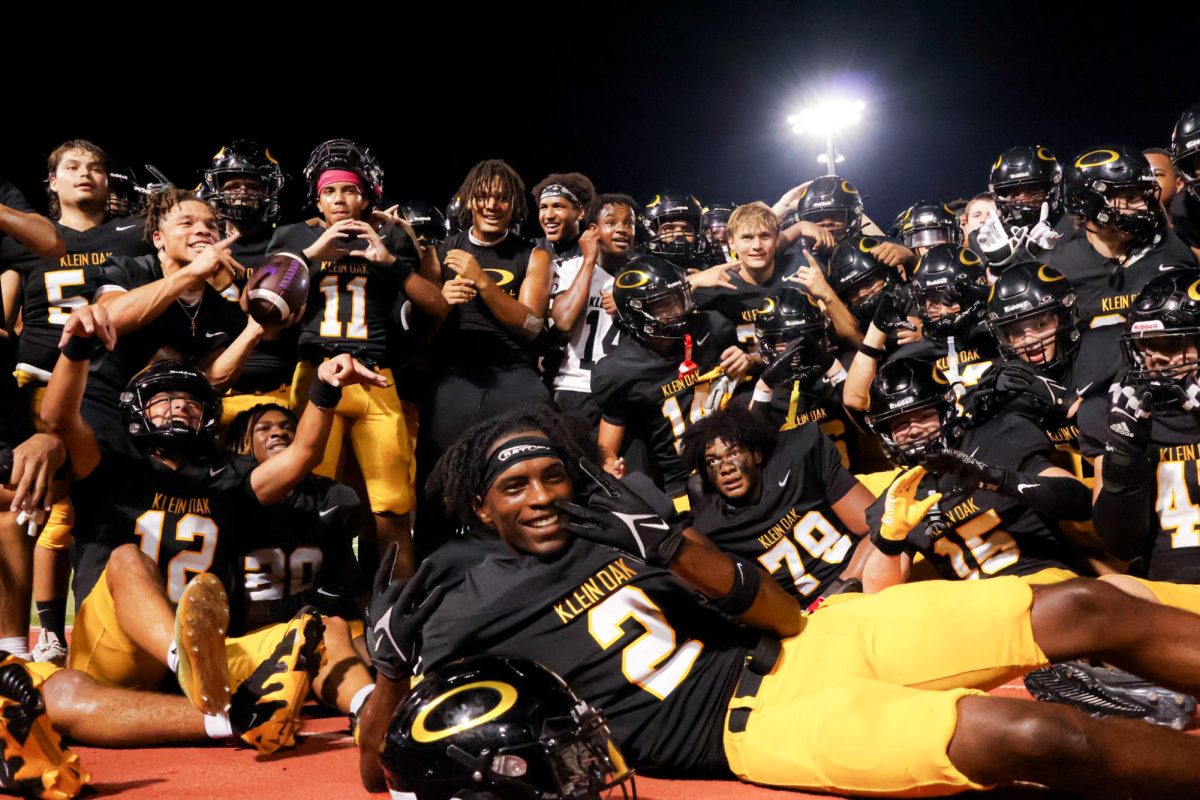 After beating Klein Cain 33-32 in the last seconds of the game, the varsity players celebrate the dub. This win marks the first time the Panthers have beat the Hurricanes out of the history of their matchups.