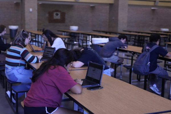 Students sit in the commons during a tardy sweep. Students caught in more than one sweep may face harsh consequences including ISS.