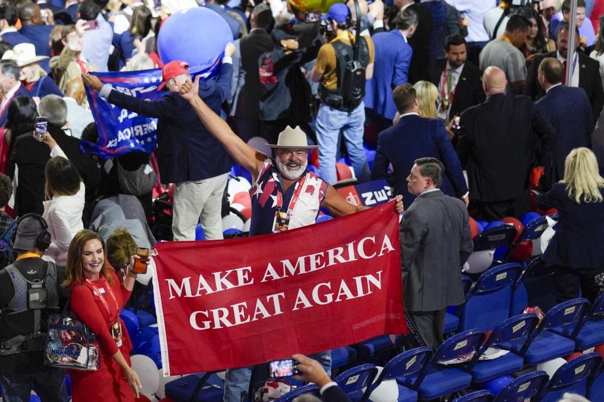 Supporters at the Republican National Convention wore red, white and blue and carried Trump/Vance signs to show their support.