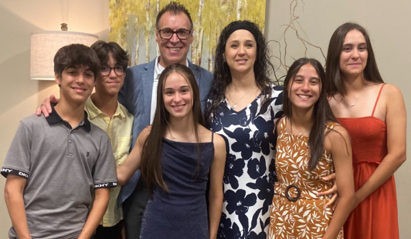 Gathered for a picture, Andre, Josh, Alessandra, Ana and Abby along with their parents Enrique and Lorena prepare for time together as a family. Photo courtesy of Alessandra Puig