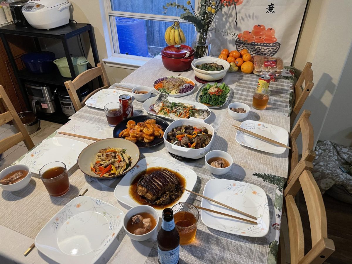 When preparing for the Lunar New Year’s festival, Kai-Lin Hsu sets this table spread with her mom. “We make different foods to celebrate traditional Chinese beliefs,” Hsu said. “The fish in the photo means ‘year-after-year’ which is a Chinese idiom for ‘harmony’ for the new year. The different foods in the photo are braised pork with preserved vegetables, prawns with eggplant sauce, cold noodles, steamed fish, duck with beer, fried corn carrots, braised greens, and fish head casserole.”