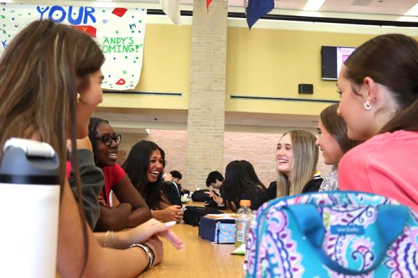 With the new technology ban on personal devices, freshmen Kennedy Furguson, Peyton Lewis, Vanesa Morillo, Ashton Mazon, Jordyn Dixon, and Brooklyn Rambin spend time catching up with each other during their lunch since phones are not allowed between 7:04 a.m. 2:35 p.m.