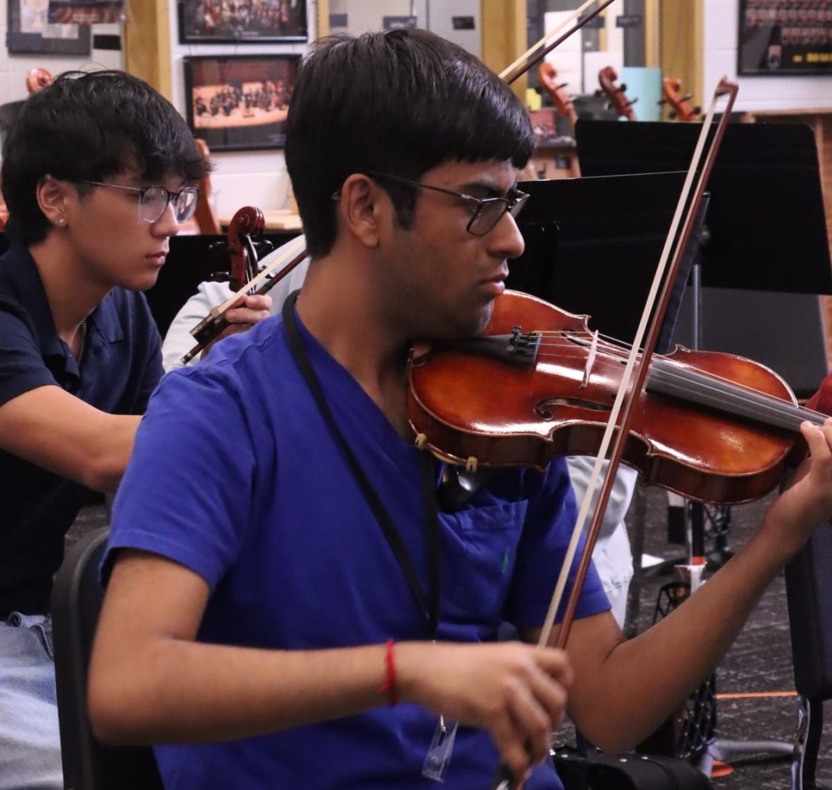 During orchestra class, current no. 1 ranked and senior Raj Ghosh, practices the violin for an upcoming performance. Gosh is also part of the UIL Science Team and National Honor Society.