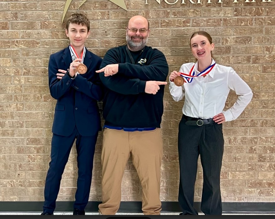 Declan Grady, Coach Ronnie Massey and Sophia Freed, pose with their medals at UIL tournament CX-Policy Debate. They finished 5th in UIL earning KO’s first UIL medal in policy debate. 